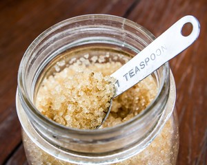 Brown sugar in silver spoon