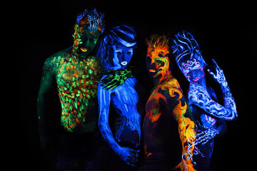 Body art glowing in ultraviolet light