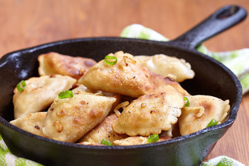 Dumplings fried with onion
