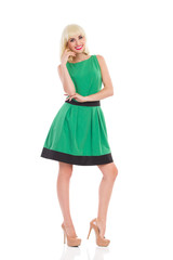 Elegance blonde girl in green dress