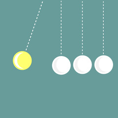 Four hanging round balls. White and yellow. Perpetual motion.