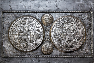 The ancient metallic plaque depict the map of the world