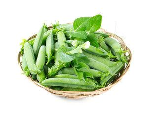 fresh pea pods in a basket isolated on white