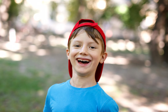 Little boy laughing outdoor