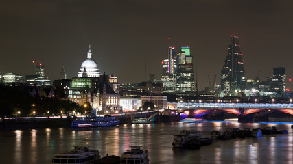 Fototapeta na wymiar London by night showing River Thames, St Paul's Cathedral etc