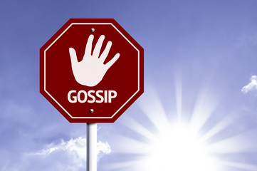 Stop Gossip red sign with sun background