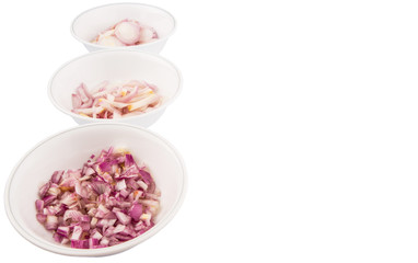 Different shape of chopped onions in bowls 
