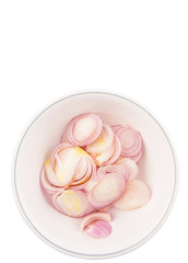 Chopped onions in a bowl over white background