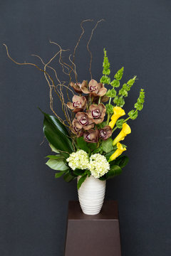 Floral arangement with Calla, cymbidium, Hydrangea, moluccella