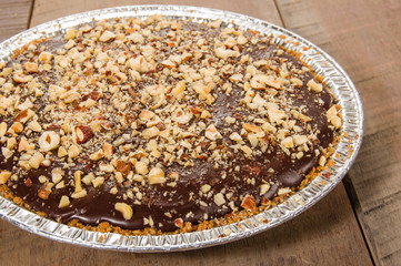 Chocolate pie with frosted nut topping