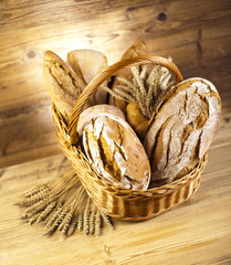Fototapeta na wymiar Baked bread in basket 
