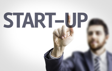 Business man pointing the text: Start-Up