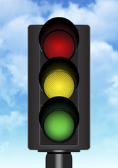 traffic light with a beautiful blue sky in background