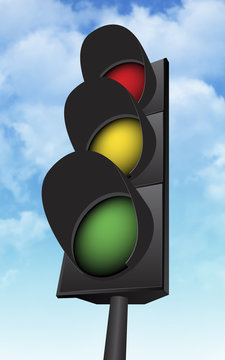 traffic light with a beautiful blue sky in background
