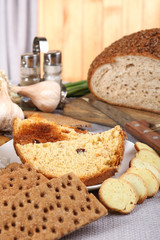 Homemade croutons on table in kitchen, close up