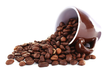 Mug of coffee beans isolated on white