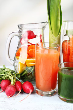 Jar of cut vegetables and glass of fresh vegetable juice with © Africa Studio