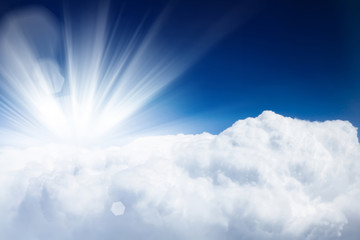 Blue sky with clouds and sun