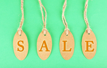 Brown tags on colorful background