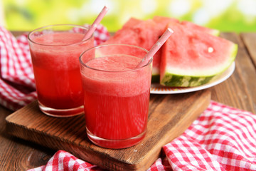 Juicy watermelon on table on bright background