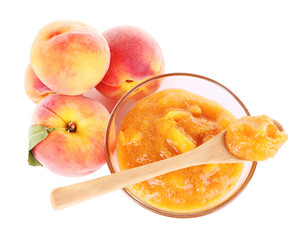tasty peach jam with fresh peaches, isolated on white