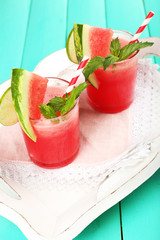 Watermelon cocktail on table, close-up