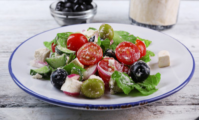 Plate of Greek salad served with olives