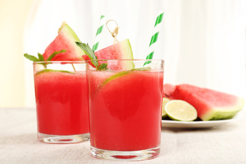 Watermelon cocktail on table, close-up