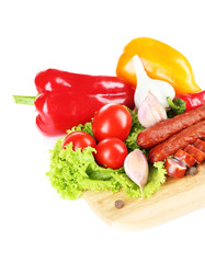 Smoked thin sausages and vegetables