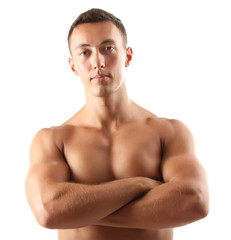 Handsome muscle young man isolated on white