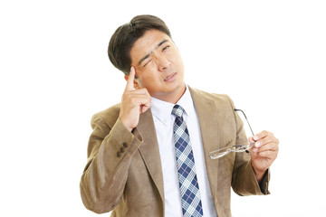 頭痛を訴える男性