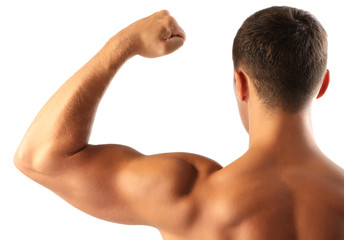Muscle young man isolated on white
