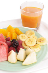 Slices of fruits with berries