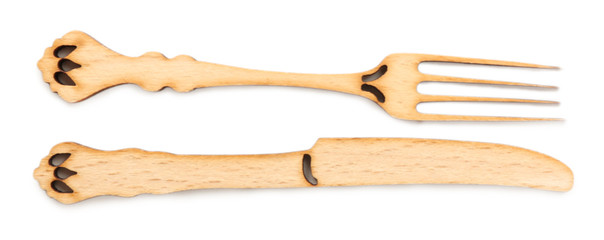 Decorative wooden utensils isolated on white