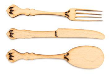 Decorative wooden utensils isolated on white