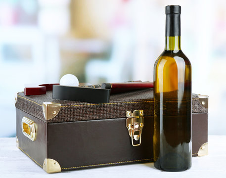 Golf Set In Suitcase With Bottle Of Wine