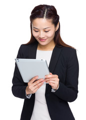 Asian businesswoman use tablet