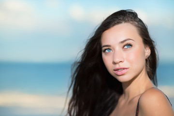 Fototapeta premium Portrait of thoughtful young brunette