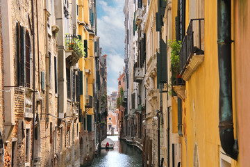 House in a narrow canal in Venice, Italy