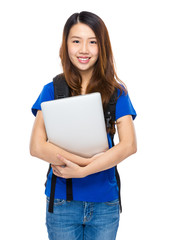 Student with backpack and laptop computer