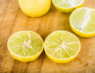 Fototapeta na wymiar group of lemon isolated on wood