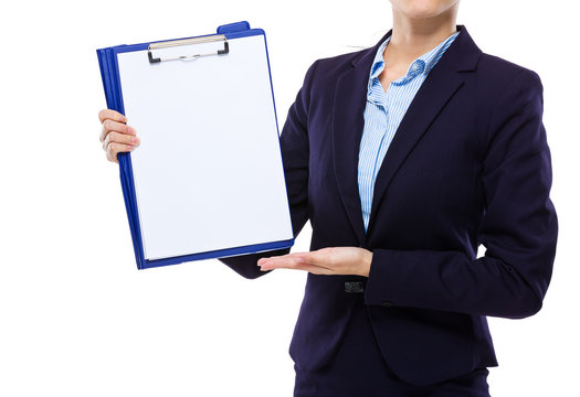 Businesswoman show with the blank paper on clipboard