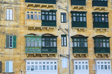 Fototapeta na wymiar a terraced building in malta