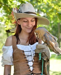 falconer holding barn owl