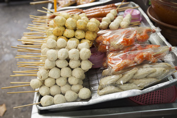 meat ball and sausage with bamboo stick