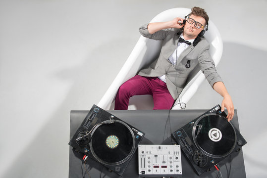 Dj At Work In Bath Isolated On White Background