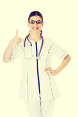 Fototapeta na wymiar Young beautiful doctor, nurse with stethoscope.