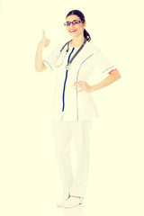 Fototapeta premium Young beautiful doctor, nurse with stethoscope.