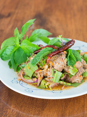 Sliced grilled pork salad