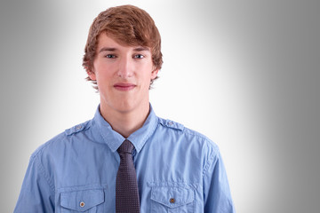 Young sporty man in shirt and tie